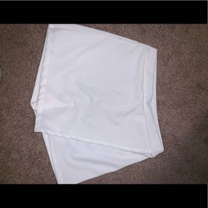 Asymmetrical white skirt